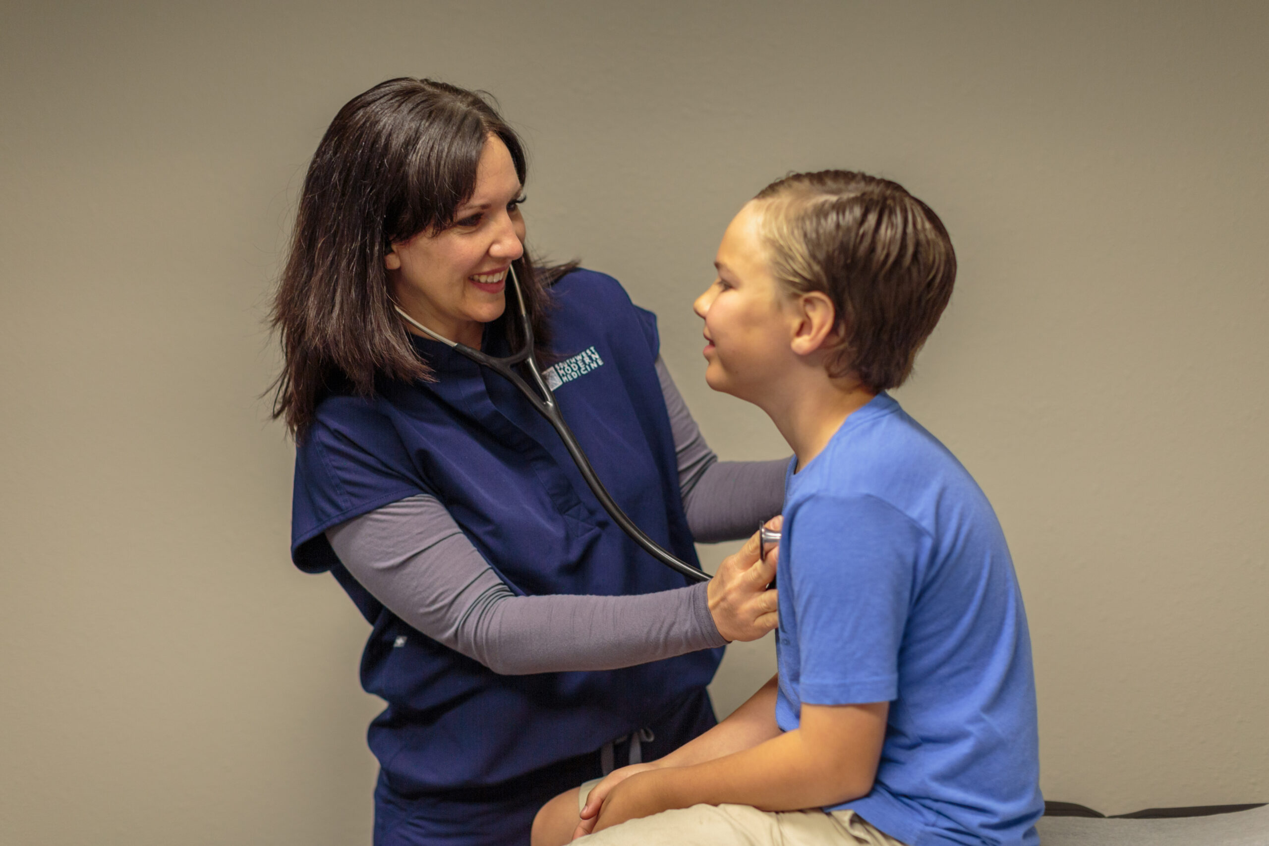 image of a young boy getting his heart rhythm checked during a routine checkup